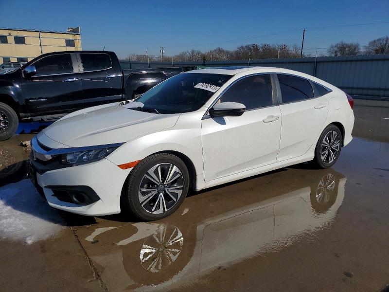 HONDA CIVIC EX 2018 with VIN JHMFC1F38JX030833 - Photo from auction