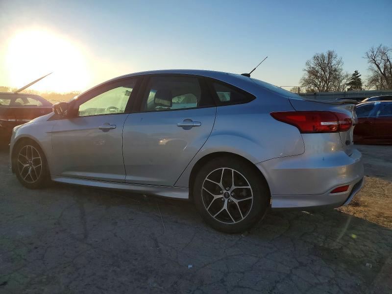 Photo 2 from auction – 2015 FORD FOCUS SE with VIN 1FADP3F28FL293781