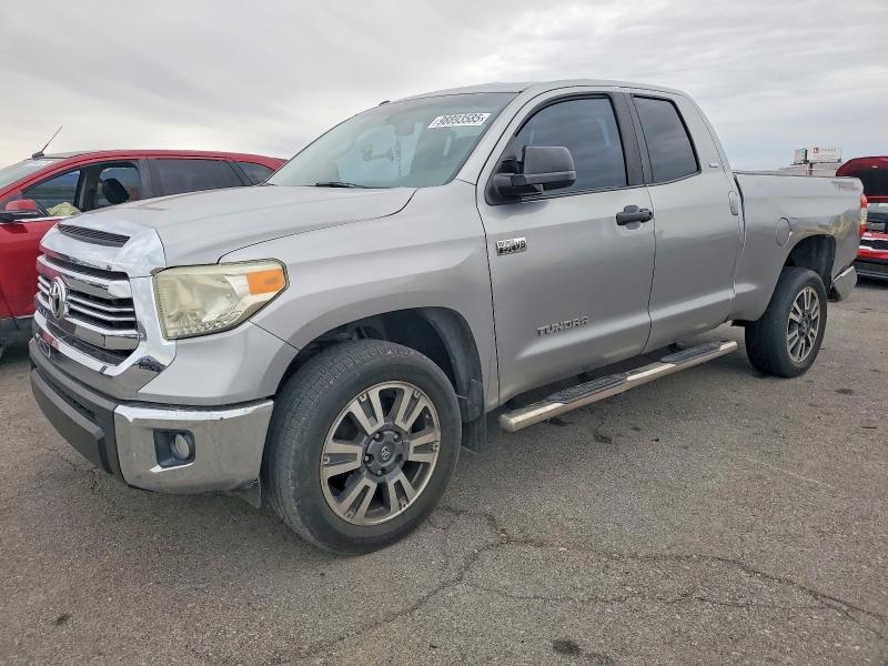 TOYOTA TUNDRA 2014 with VIN 5TFRY5F14EX164590 - Photo from auction
