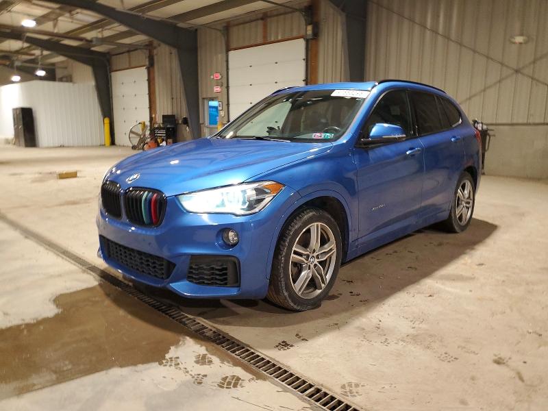 BMW X1 XDRIVE2 2017 with VIN WBXHT3C33H5F74792 - Photo from auction