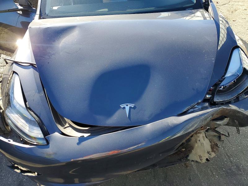 Photo 12 from auction – 2023 TESLA MODEL 3 with VIN 5YJ3E1EA4PF403951
