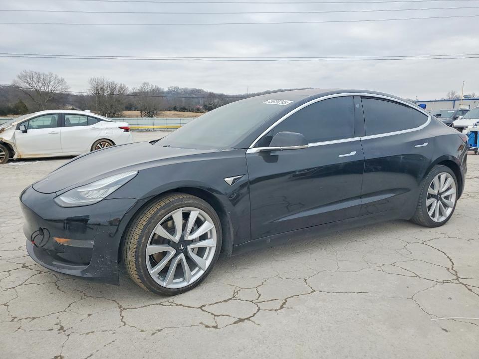 TESLA MODEL 3 2018 with VIN 5YJ3E1EB0JF178556 - Photo from auction