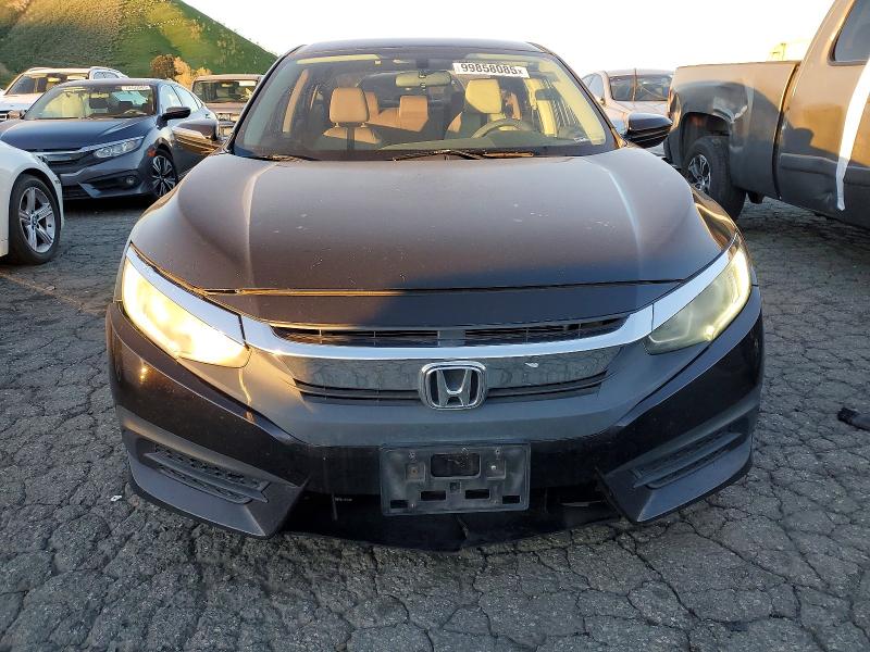 Photo 5 from auction – 2016 HONDA CIVIC with VIN 19XFC2F53GE245635