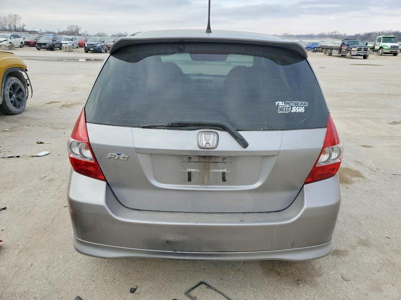 Photo 6 from auction – 2007 HONDA FIT with VIN JHMGD37677S039129