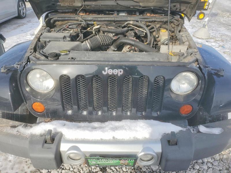 Photo 12 from auction – 2011 JEEP WRANGLER S with VIN 1J4AA5D13BL564528