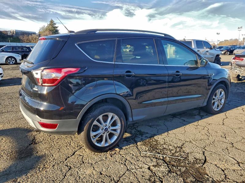 Photo 3 from auction – 2017 FORD ESCAPE SE with VIN 1FMCU0G92HUB29993
