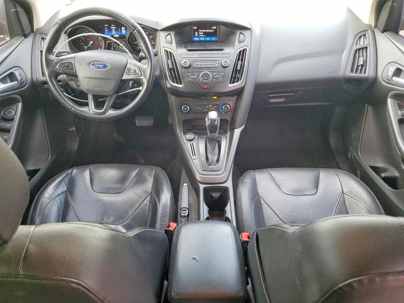 Photo 8 from auction – 2015 FORD FOCUS SE with VIN 1FADP3F28FL324611