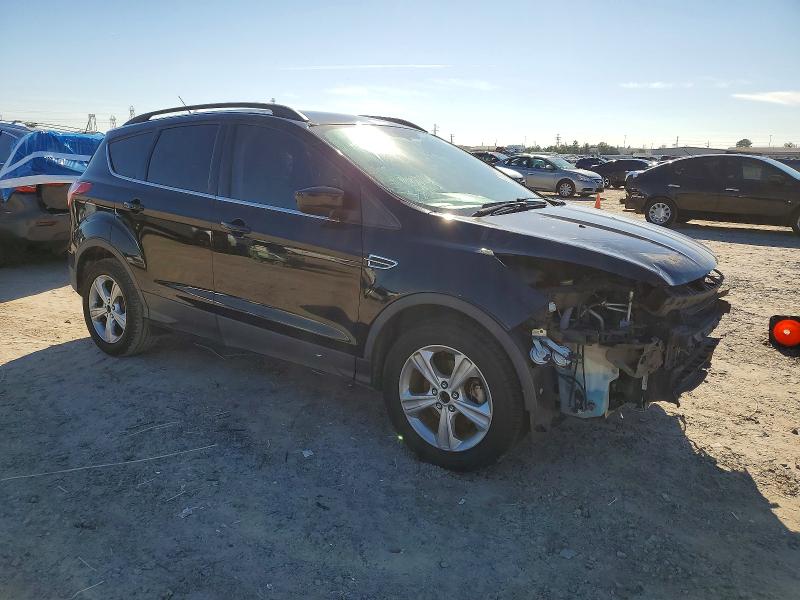 Photo 4 from auction – 2016 FORD ESCAPE SE with VIN 1FMCU0GX7GUA38554