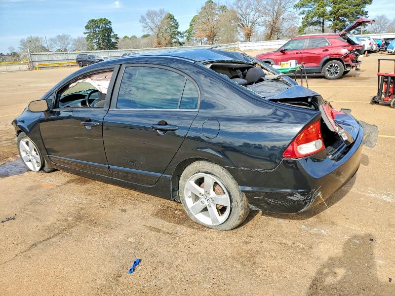 Photo 2 from auction – 2011 HONDA CIVIC LX-S with VIN 19XFA1F64BE030332