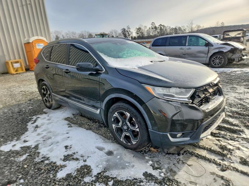 Photo 4 from auction – 2018 HONDA CR-V with VIN 7FARW1H92JE010180