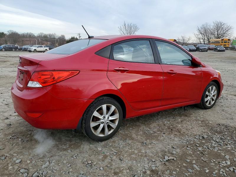 Photo 3 from auction – 2014 HYUNDAI ACCENT GLS with VIN KMHCU4AEXEU608803