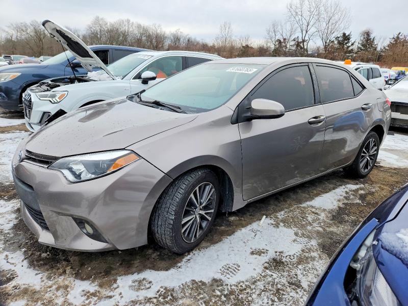TOYOTA COROLLA 2016 with VIN 5YFBURHE0GP414204 - Photo from auction