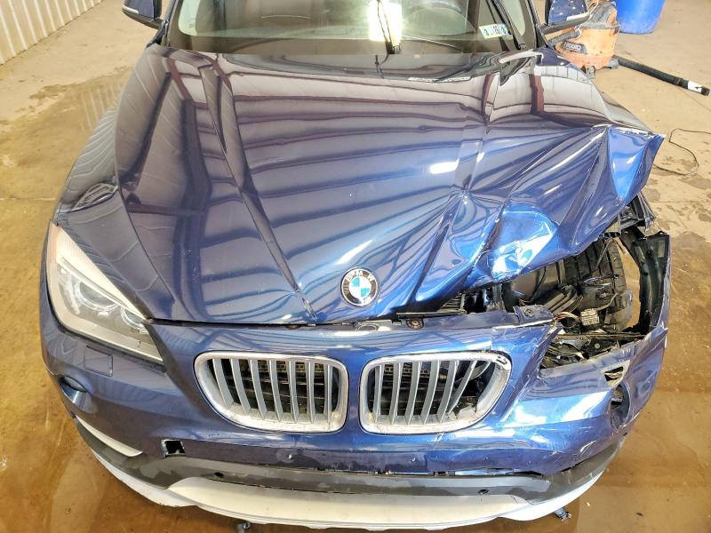 Photo 12 from auction – 2015 BMW X1 XDRIVE3 with VIN WBAVM5C54FVV95040