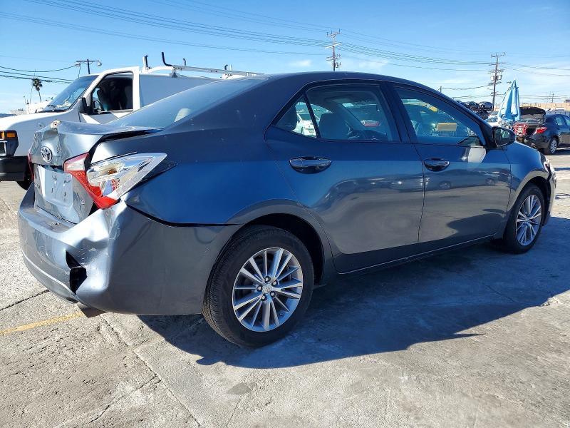 Photo 3 from auction – 2014 TOYOTA COROLLA L with VIN 5YFBURHE6EP103521