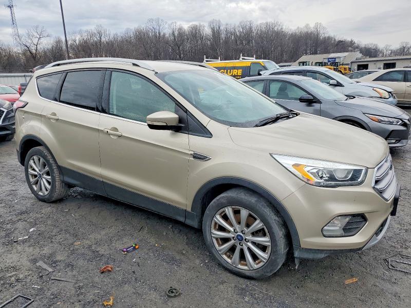 Photo 4 from auction – 2017 FORD ESCAPE TIT with VIN 1FMCU9JD9HUB50552