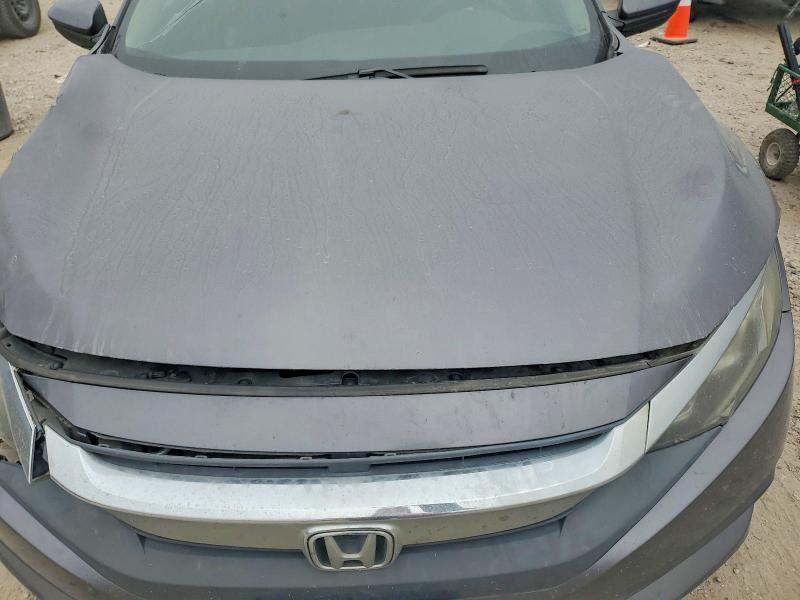 Photo 11 from auction – 2018 HONDA CIVIC with VIN 2HGFC2F54JH602902