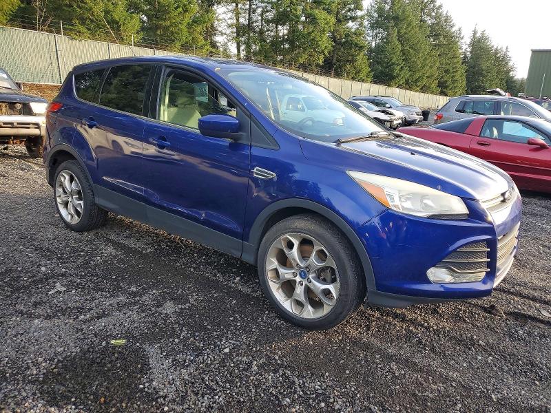 Photo 4 from auction – 2014 FORD ESCAPE SE with VIN 1FMCU9G99EUC95895