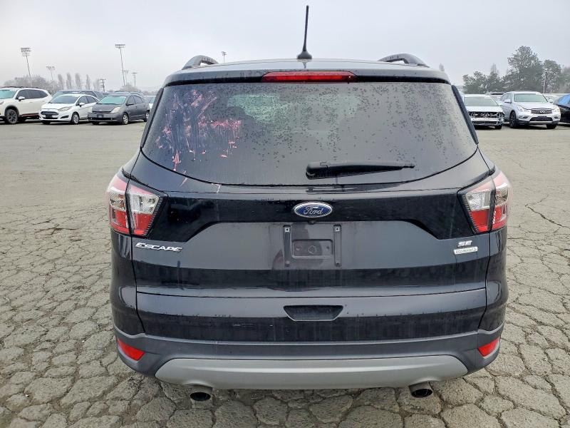 Photo 6 from auction – 2018 FORD ESCAPE SE with VIN 1FMCU0GD0JUA31247