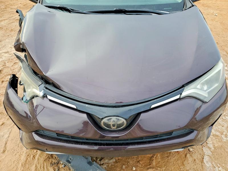 Photo 11 from auction – 2018 TOYOTA RAV4 with VIN 2T3WFREV1JW515734