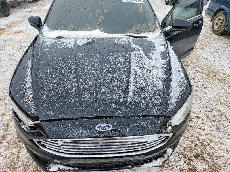 Photo 11 from auction – 2017 FORD FUSION with VIN 3FA6P0H73HR178428