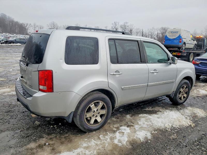 Foto 3 de la subasta – 2011 HONDA PILOT TOUR con VIN 5FNYF4H90BB002282
