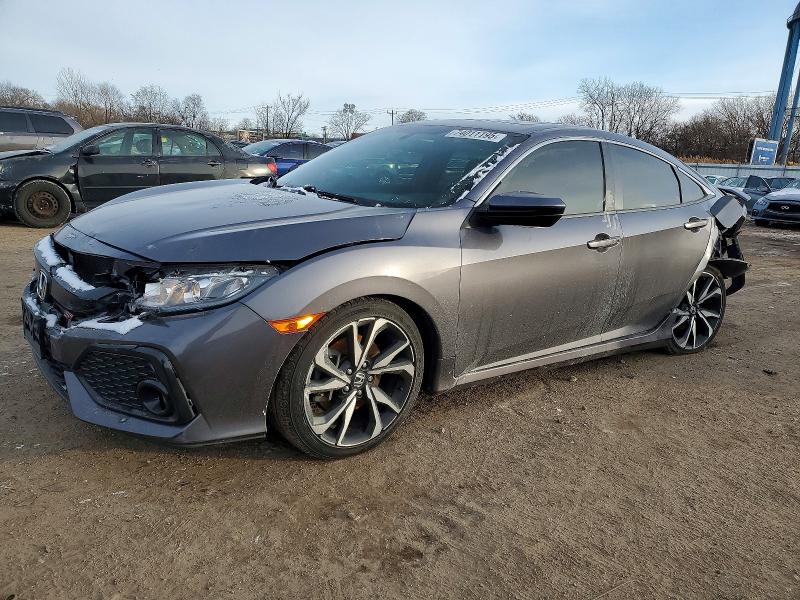HONDA CIVIC SI 2018 with VIN 2HGFC1E57JH706389 - Photo from auction