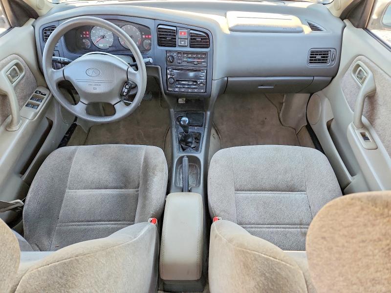 Снимка 8 от търг – 1999 INFINITI G20 с VIN JNKCP11AXXT021144