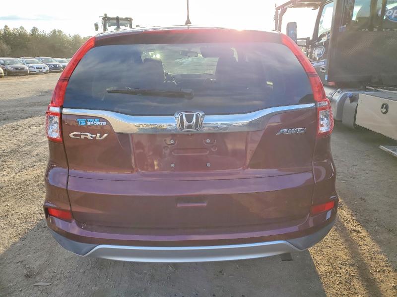 Photo 6 from auction – 2015 HONDA CR-V with VIN 2HKRM4H57FH605440