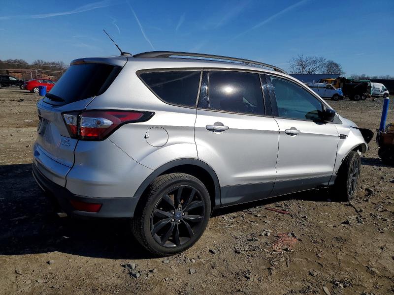 Photo 3 from auction – 2018 FORD ESCAPE SE with VIN 1FMCU0GD6JUA52765