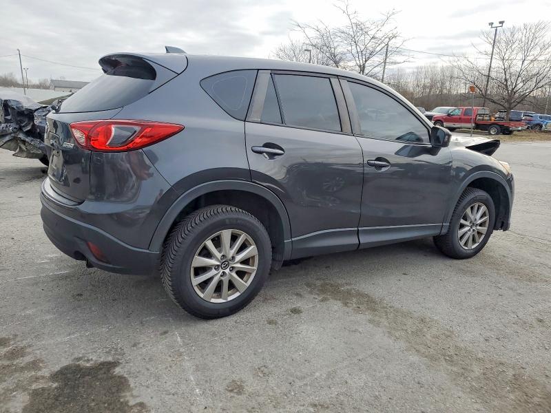 Photo 3 from auction – 2015 MAZDA CX-5 SPORT with VIN JM3KE2BE7F0461095