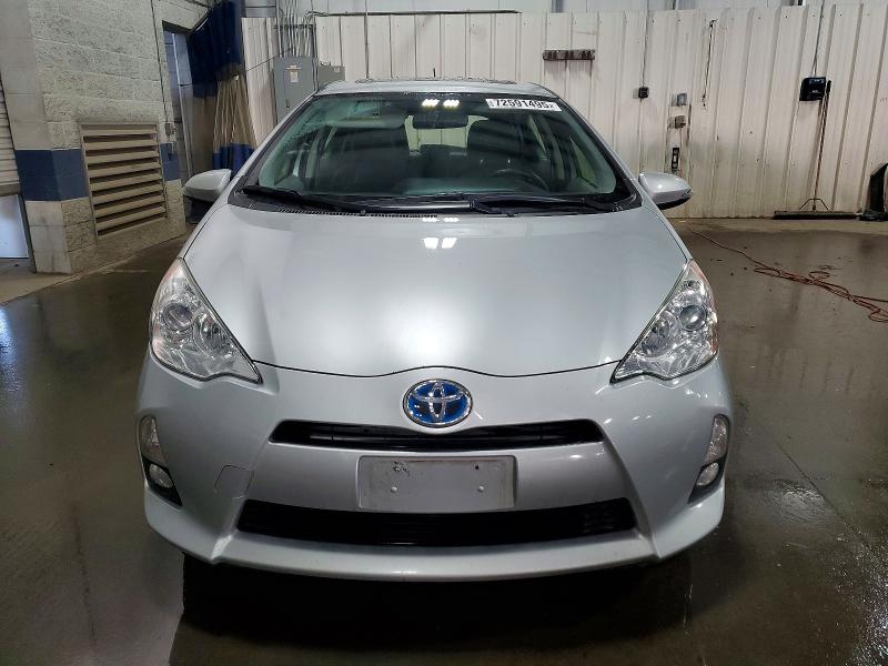 Photo 5 from auction – 2013 TOYOTA PRIUS C with VIN JTDKDTB33D1054060