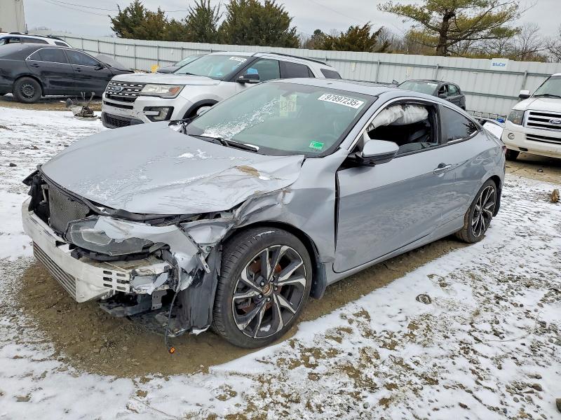 HONDA CIVIC 2017 with VIN 2HGFC3A55HH754839 - Photo from auction