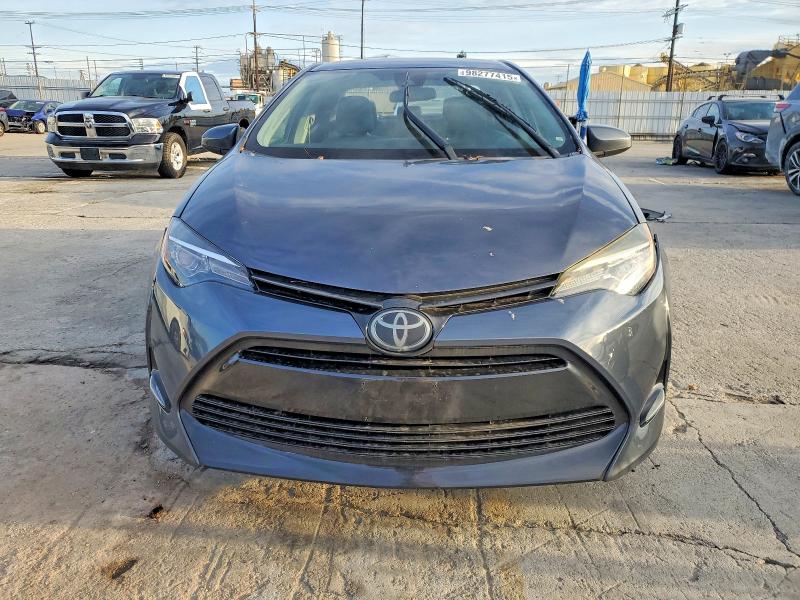Photo 5 from auction – 2017 TOYOTA COROLLA L with VIN 5YFBURHE5HP704889
