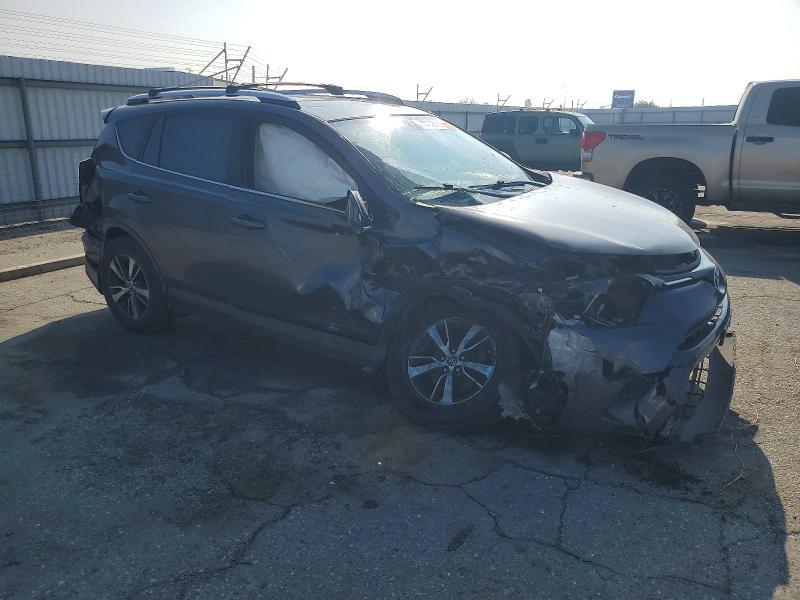 Photo 4 from auction – 2016 TOYOTA RAV4 with VIN JTMWFREV6GJ070057