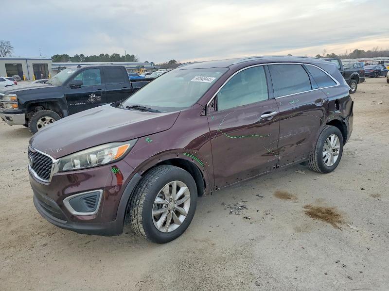 KIA SORENTO LX 2016 with VIN 5XYPG4A30GG066417 - Photo from auction