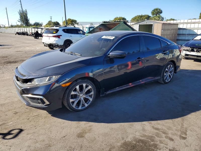 HONDA CIVIC LX 2019 with VIN 2HGFC2F61KH586880 - Photo from auction