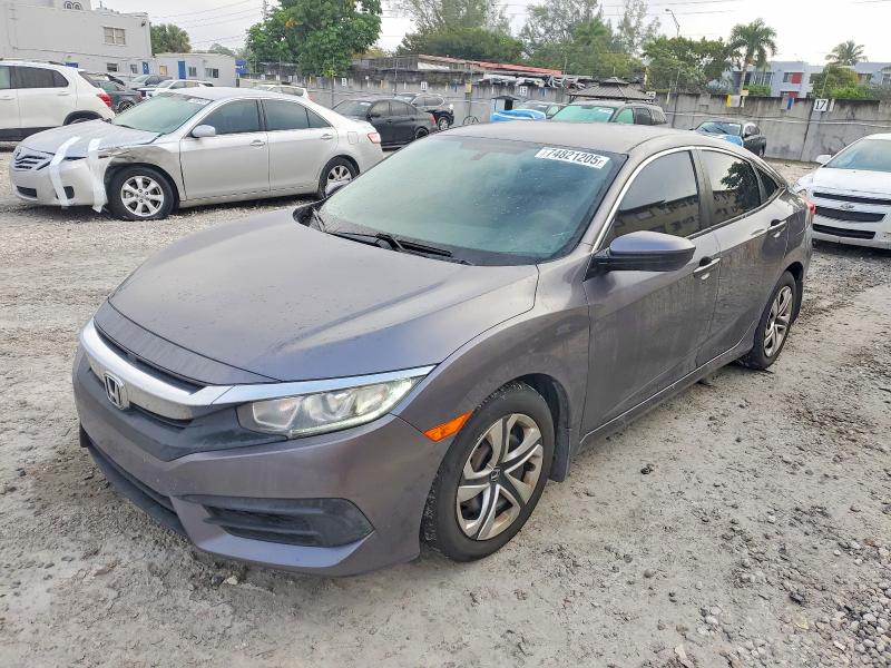 HONDA CIVIC LX 2017 with VIN 19XFC2F58HE031161 - Photo from auction