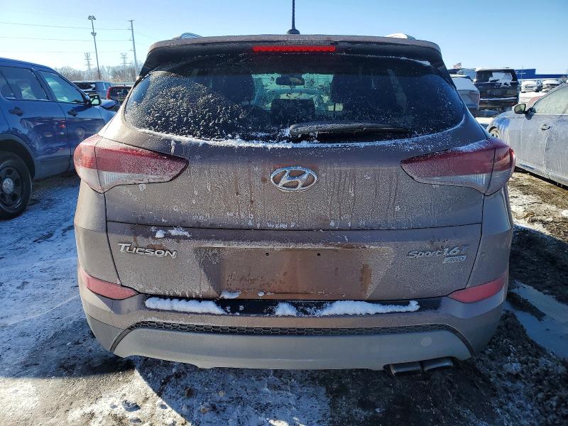 Photo 6 from auction – 2017 HYUNDAI TUCSON LIM with VIN KM8J3CA21HU379717