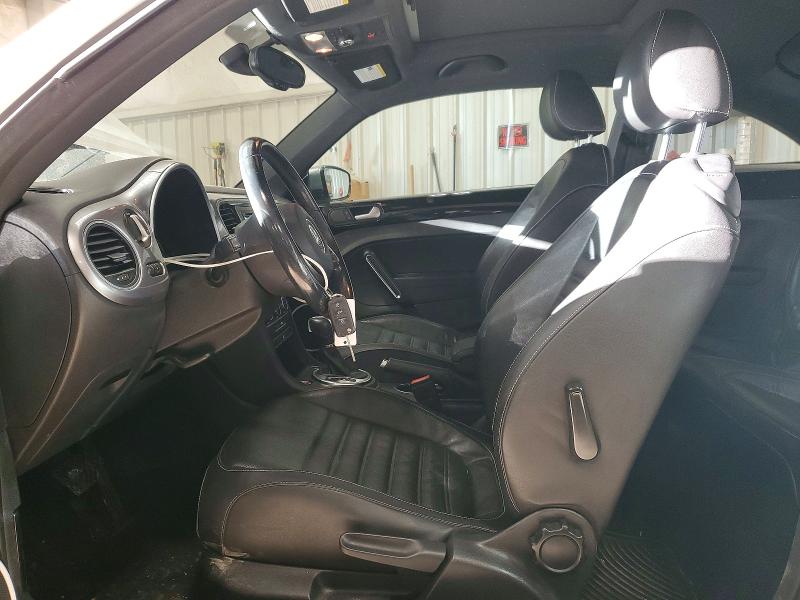 Photo 7 from auction – 2014 VOLKSWAGEN BEETLE with VIN 3VWJ17AT7EM655261
