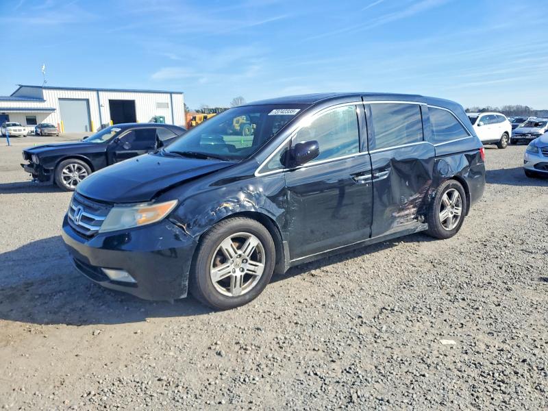 Photo 1 from auction – 2012 HONDA ODYSSEY TO with VIN 5FNRL5H95CB141103