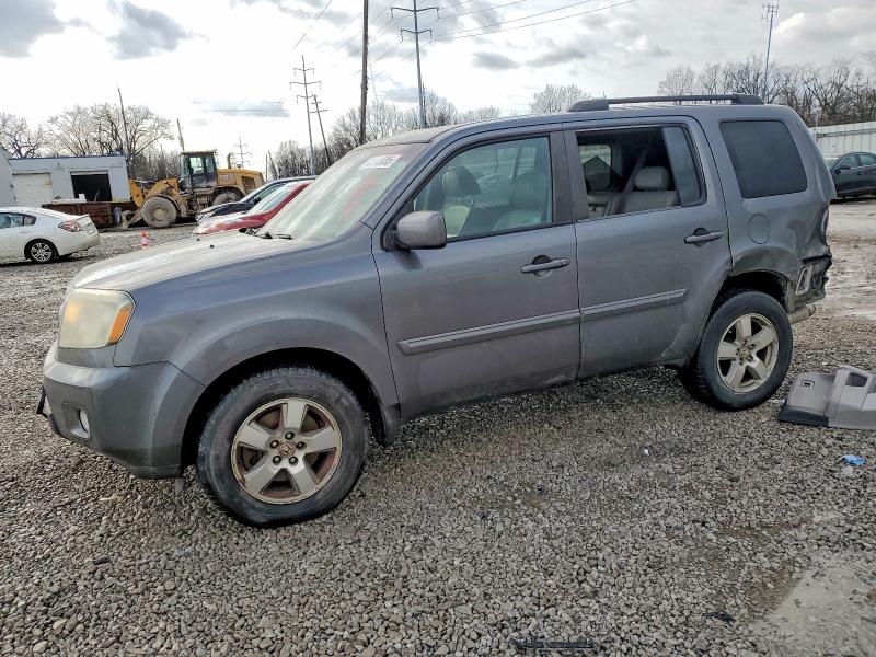 HONDA PILOT EXL 2011 with VIN 5FNYF4H59BB049386 - Photo from auction