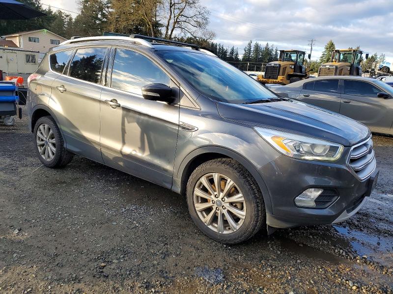 Photo 4 from auction – 2017 FORD ESCAPE TIT with VIN 1FMCU9JD7HUA11536