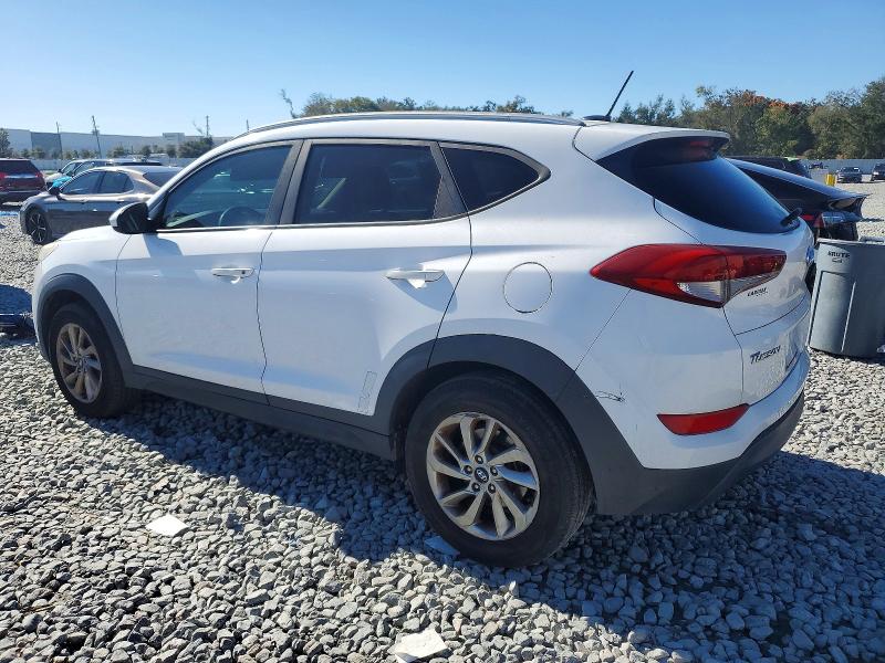Photo 2 from auction – 2016 HYUNDAI TUCSON with VIN KM8J33A43GU161374