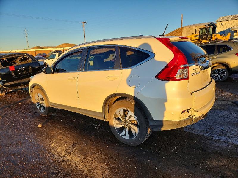 Photo 2 from auction – 2016 HONDA CR-V with VIN 5J6RM4H93GL055034