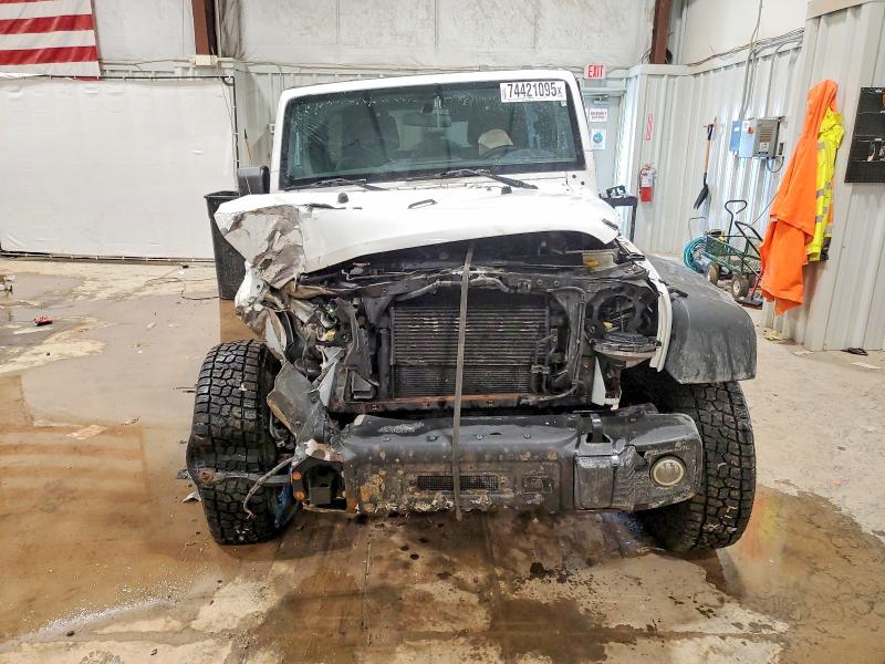 Photo 5 from auction – 2014 JEEP WRANGLER U with VIN 1C4BJWDG8EL211890