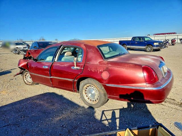 Photo 2 from auction – 1998 LINCOLN TOWN CAR E with VIN 1LNFM81W0WY679080