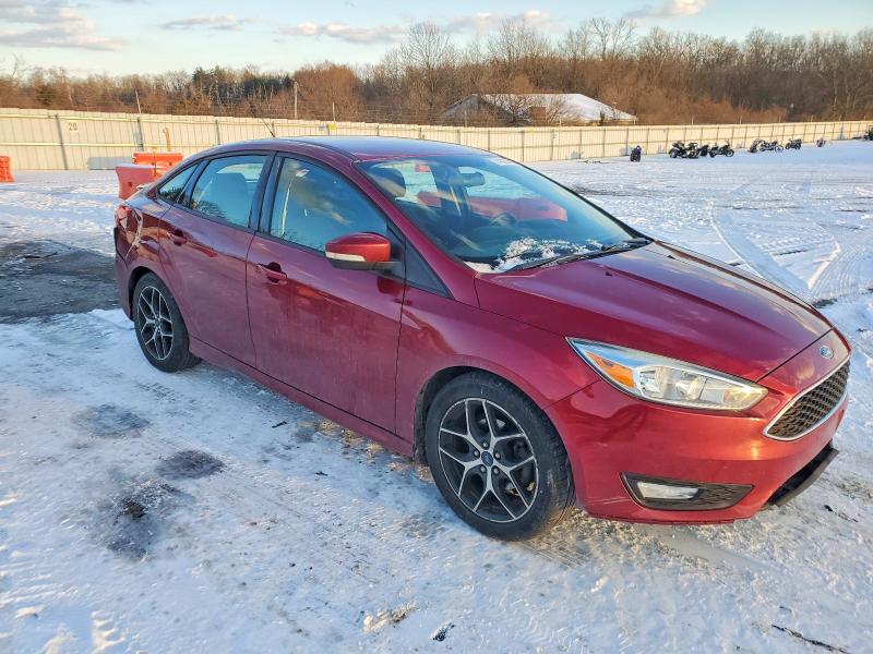 Photo 4 from auction – 2015 FORD FOCUS with VIN 1FADP3F20FL213762