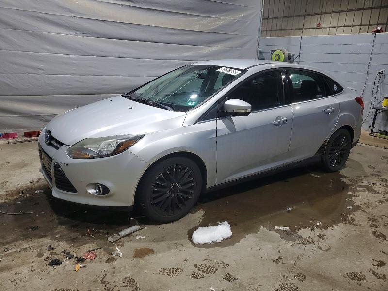 FORD FOCUS TITA 2013 with VIN 1FADP3J29DL358576 - Photo from auction