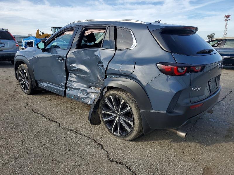 Photo 2 from auction – 2023 MAZDA CX-50 PREM with VIN 7MMVABEM3PN101430