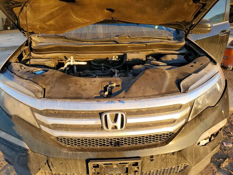 Photo 12 from auction – 2016 HONDA PILOT EXL with VIN 5FNYF6H55GB085093
